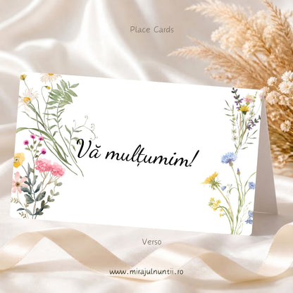 Set 50 plicuri de bani nuntă și botez C.47, spatele: mesajul „Vă mulțumim!” între flori de câmp în acuarelă, roz, galbene, mov și albăstrele, pe fond alb