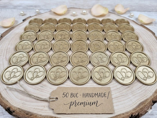 Set 50 sigilii din ceară naturală auriu metalic cu design inimi și simbolul infinitului, handmade pentru invitații de nuntă premium.